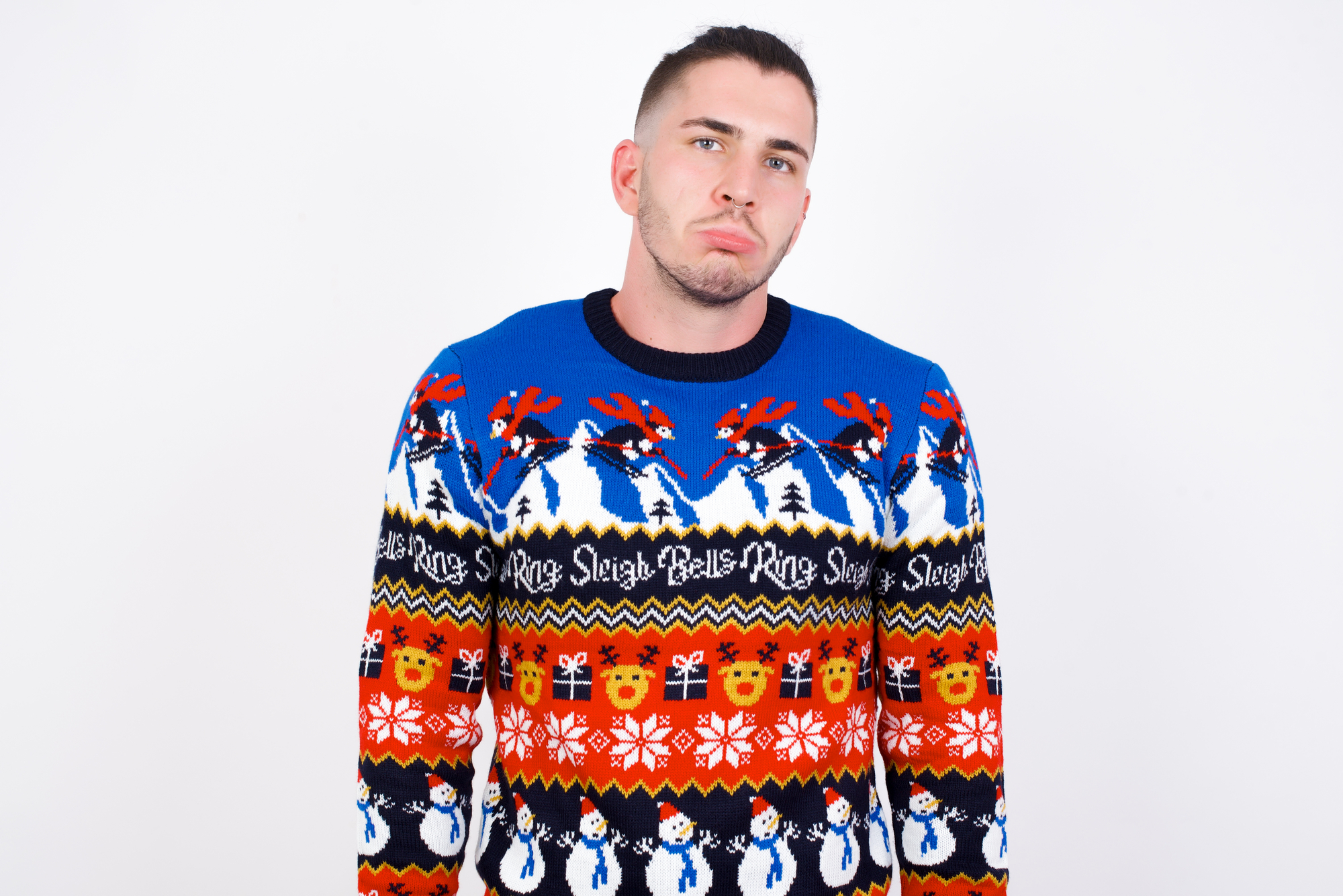 An man wearing an ugly Christmas sweater ultimately dominates the official bar crawl.