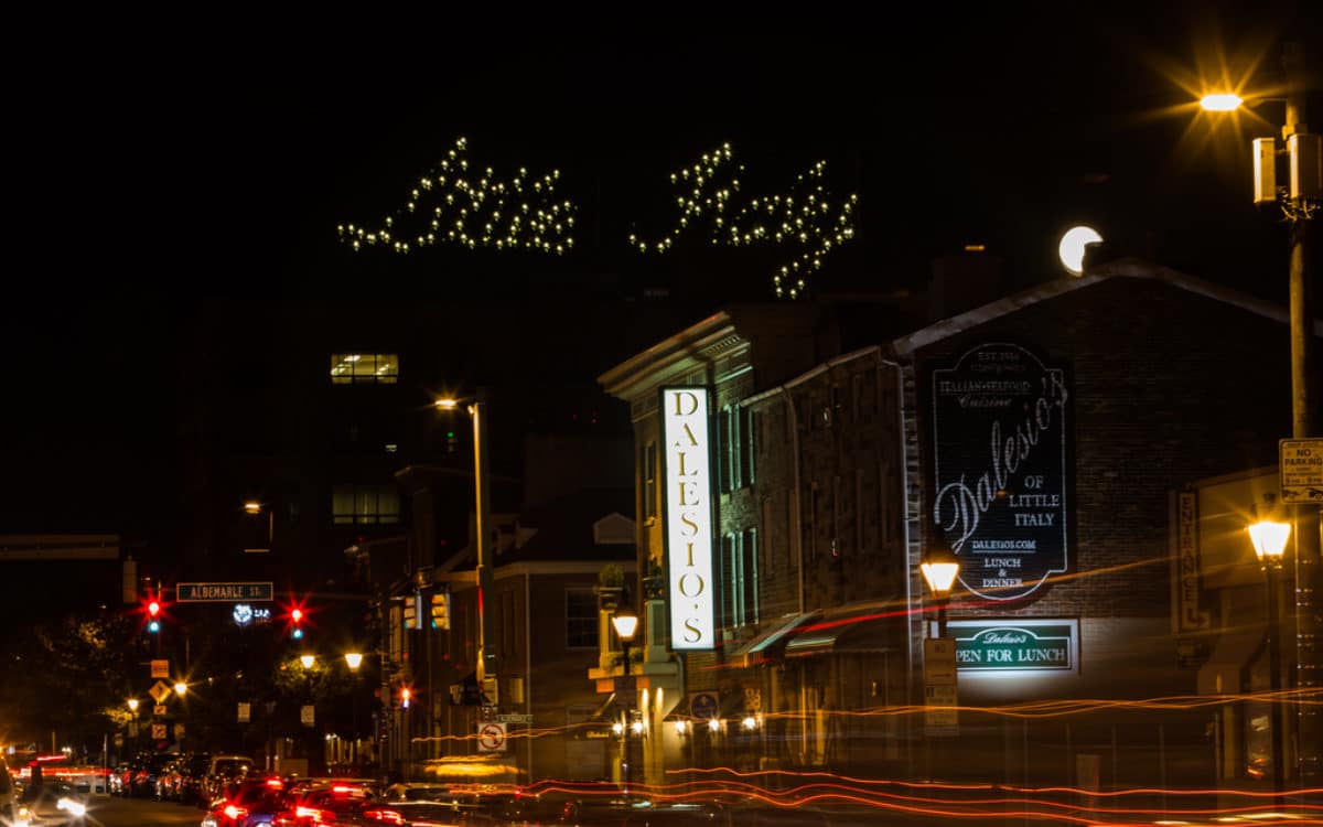 A charming city street at night in Baltimore's Little Italy.