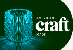 A glowing, intricately designed glass vessel sits next to the words 